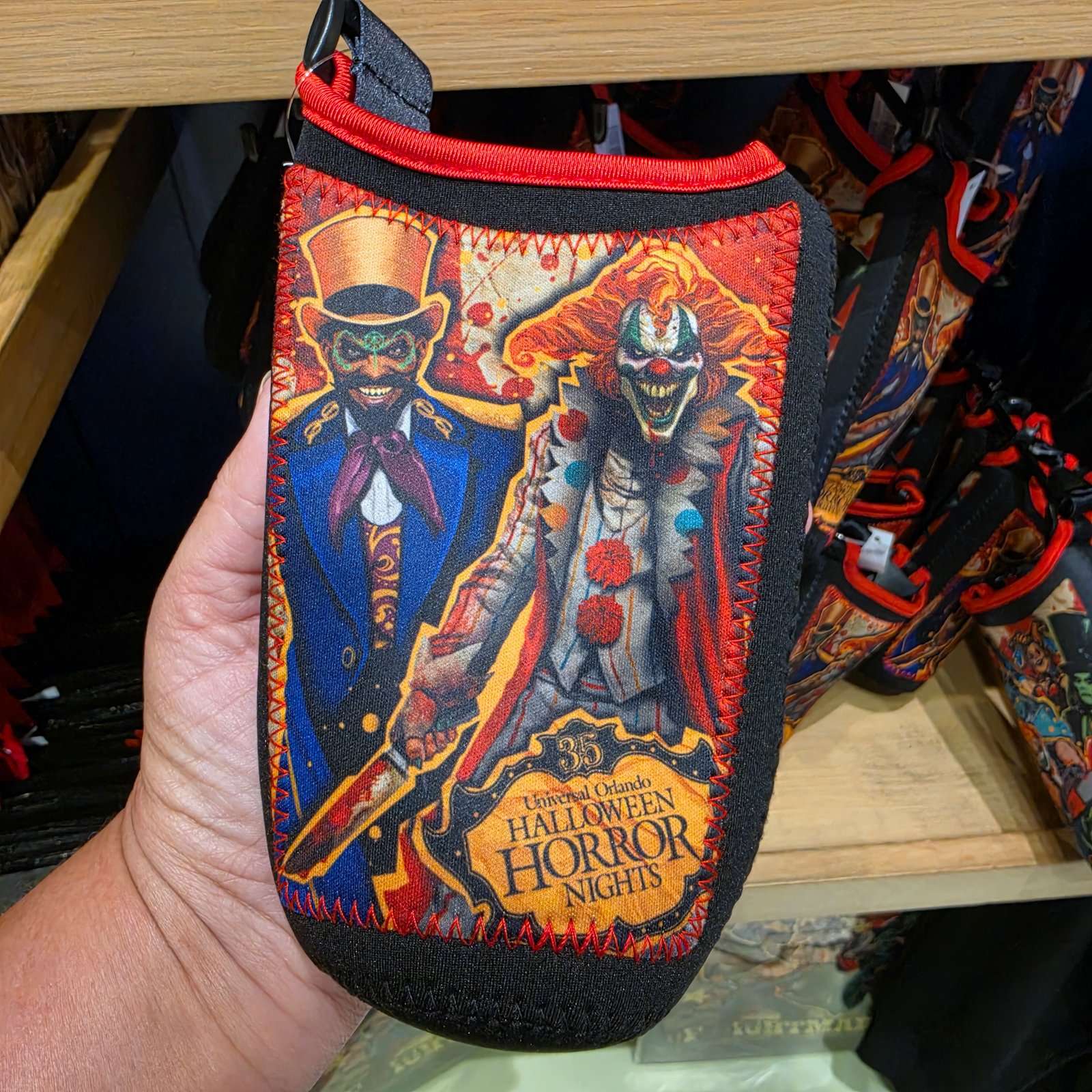 Universal Orlando HHN 35 Infernal Carnival Icons Beverage Holder with Strap